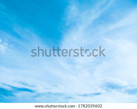 Beautiful blue sky and white clouds of various shapes with sunlight. Nature background Royalty-Free Stock Photo #1782039602