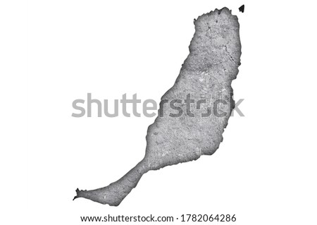 Detailed and colorful image of map of Fuerteventura on weathered concrete