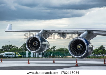 747 wing with turbofan jet engines Royalty-Free Stock Photo #1782115064