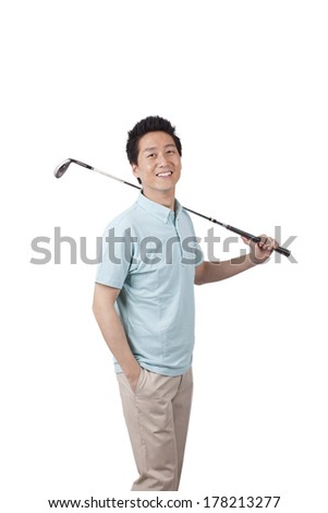 	Young man holding golf swing and smiling 	