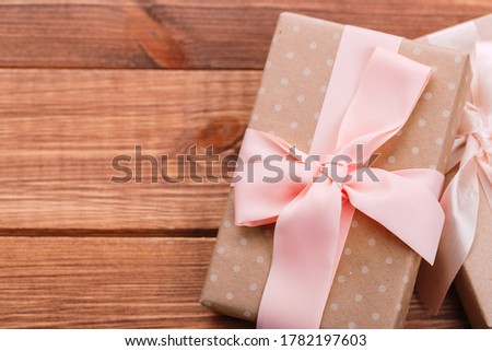 beautiful gift box with altas bow. holiday card concept.