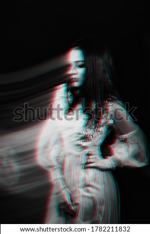 abstract portrait of a girl in a dress on a dark background with blurred. Black and white photo with 3D glitch effect