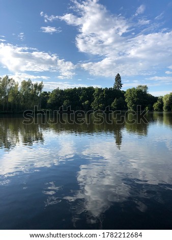 Reflection of the sky on a lake (Broad Lake, Godalming)