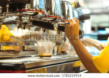 close up of barista working makeing coffee with coffee machine image color tone abstract blur background