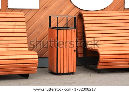 Forged benches in a leisure park in a metropolis