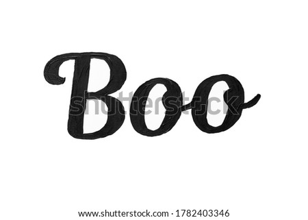 Boo. Painted lettering black oil paint on a white background, isolate, Halloween concept