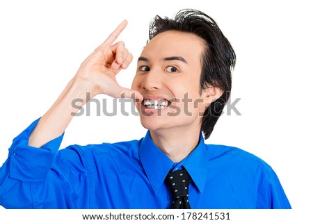 Closeup portrait of young silly goofy man gesturing with hands thumb to go out party and get drunk, hammered, wasted, tipsy, isolated on white background. Positive emotion facial expression feeling