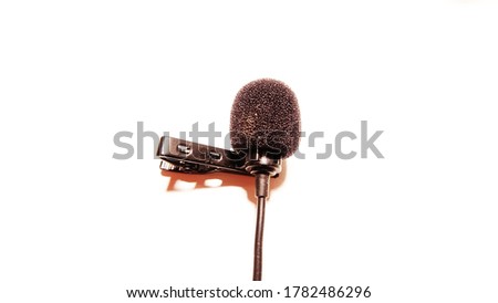 Lavalier microphone with windscreen on white background