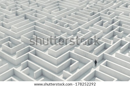 Businessman in a maze Royalty-Free Stock Photo #178252292