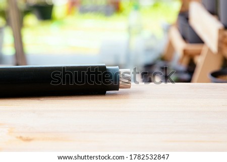 Power cables electrical on wood table with nature background