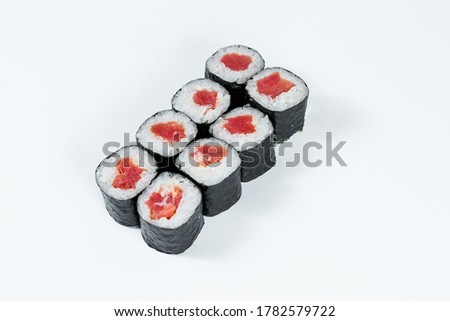 Japanese food. Rolls with red fish, fresh rice with eel, wrapped in nori.