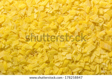 Grandmothers home made pasta, yellow texture suitable for background. very sharp details