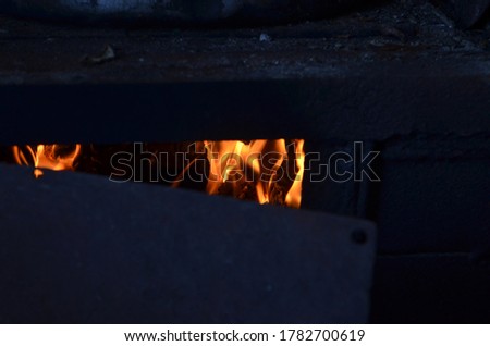 fire in the fireplace in summer