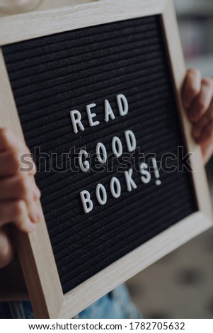 holding read good books message