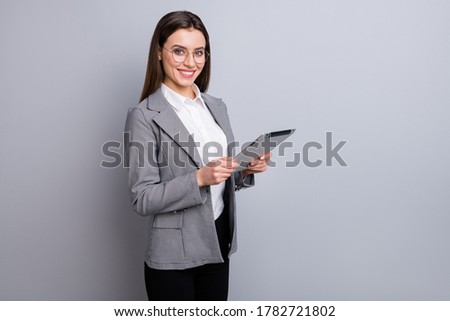 Photo of attractive business lady confident manager worker use modern technology digital tablet work remote distance wear specs shirt plaid blazer isolated grey color background