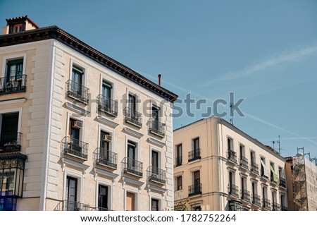 Facade of residential buildings in Madrid Royalty-Free Stock Photo #1782752264