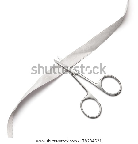 scissors to cut the ribbon on white background