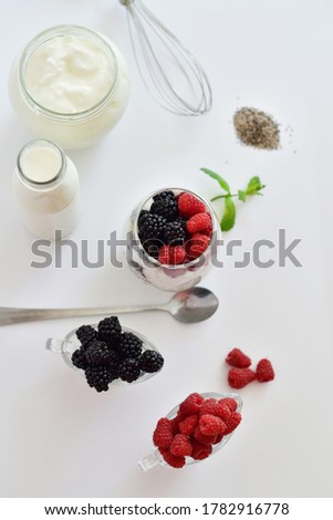 Healthy food and breakfast. glass of delicious homemade smoothie, dessert made from chia and berries. delicious milkshake, vegan raw food. Summer card. Good morning.Selective focus.top view