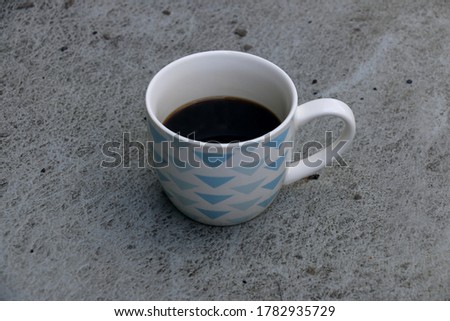 black coffee in a coffee cup isolated 