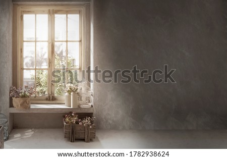 cottage vintage decoration with cement wall for retro style background with flower on window shelf 