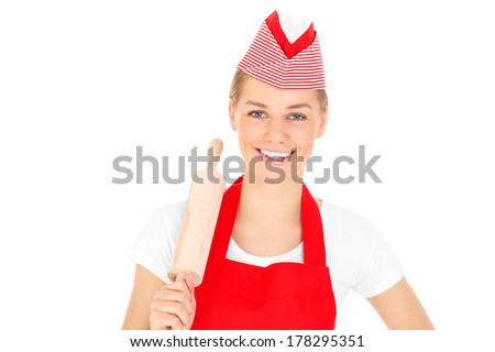A picture of a happy woman holding a wooden rolling pin over white background