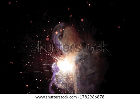 A bright flash of light and a sheaf of sparks in a cloud of smoke. Miniature Universe. Design elements for invitation, wedding cards, greeting cards, Silvester day, christmas decoration.