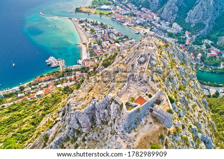 Starigrad Fortica fortress and Cetina river mouth in Omis aerial view, Dalmatia region of Croatia Royalty-Free Stock Photo #1782989909