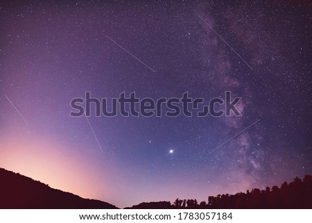 Milky Way, Jupiter and Saturt planets and satellites in the night sky.