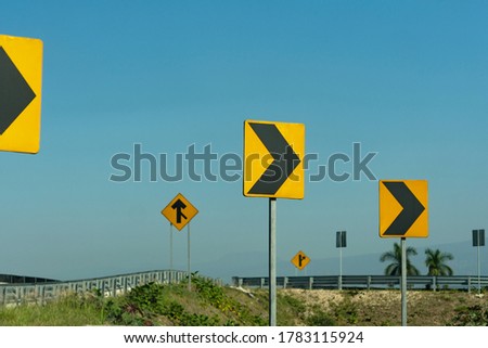 Traffic signs on a country road