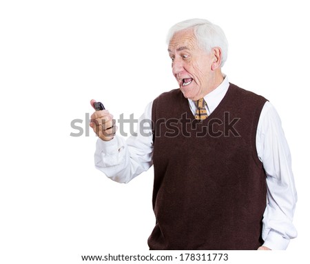 Closeup portrait of senior, old business man shocked surprised, opened mouth, eyes, by what he sees on his cell phone, isolated on white background. Human emotion, facial expression, feeling, reaction