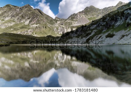 Mountains reflection in the lake, Alps, Europe