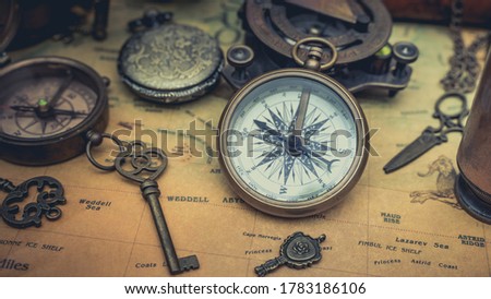 Old Map And Compass With Key