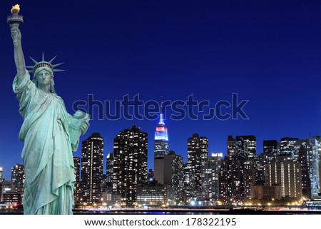 Midtown Manhattan Skyline and The Statue of Liberty at Night, New York City 