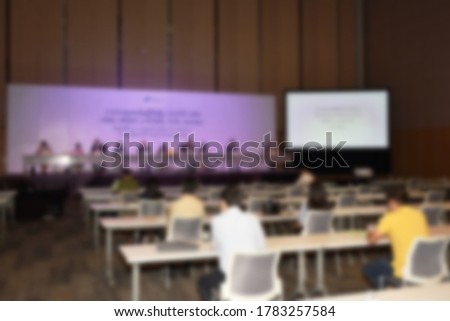 blur of stage and people meeting  in conference room