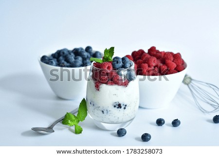 Healthy food and breakfast. glass of delicious homemade smoothie, dessert made from chia and berries. delicious milkshake, vegan raw food. Summer card. Good morning.Selective focus.top view