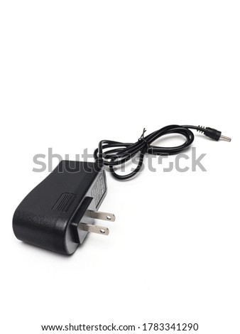 charger with american plug on white background