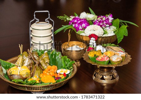 Thai Food Set , Thai cuisine. and  snack served in brass dishes. Decorated with flower, garland,