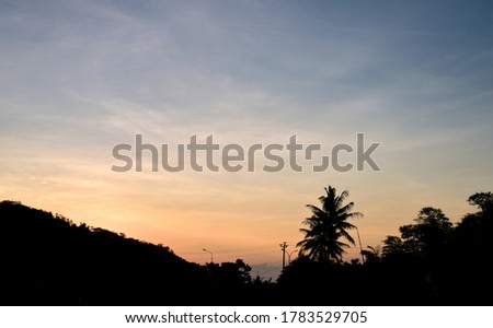 Amazing Colorful Sky and Sunset, Beautiful Peaceful Background, Beauty of the Dark Blue Hour of the Dusk, Purple Dusk Silhouette Mountain at dusk