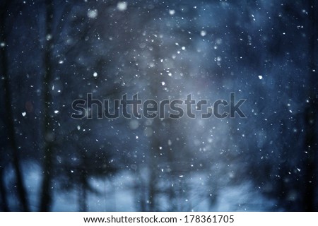 snow bokeh texture on black background Royalty-Free Stock Photo #178361705