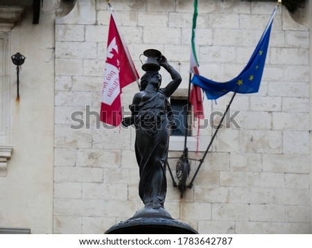 Pescocostanzo, the statuette of the fountain in Piazza Municipio - Abruzzo - Italy