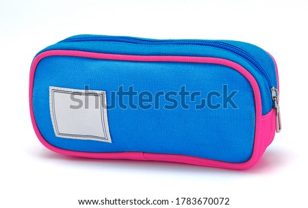 A pencil case or pencil box is a container used to store pencils. A pencil case can also contain a variety of other stationery such as sharpeners, pens, glue sticks, erasers, scissors, rulers .... Royalty-Free Stock Photo #1783670072