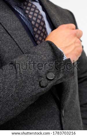 Product photography of elegant men's fashion. Suits and coats.