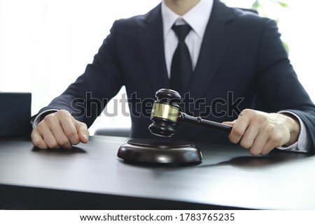 Justice lawyer holding judge gavel, Businessman in suit or lawyer, Advice and Legal services Concept.