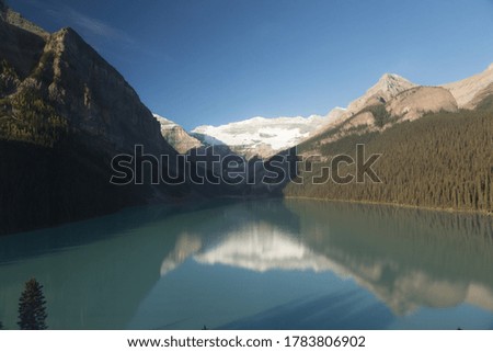 lake louise reflection and silhouette  with contrast mountain shape geometry