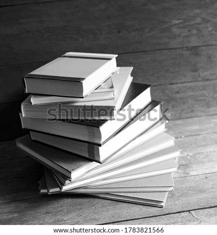 Books on a wooden table. Royalty-Free Stock Photo #1783821566