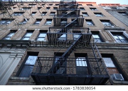 These are photos of fire escapes in Harlem. Royalty-Free Stock Photo #1783838054