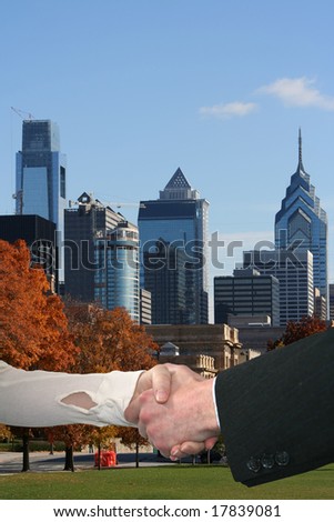business handshake with Philadelphia skyline