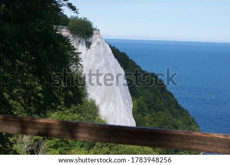 A white cliff, baltic sea, green trees, blue sky