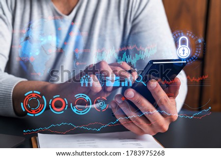 Man using phone. Hands typing smartphone. Double exposure with business icons hologram. Close up. Research and analysis concept. Investment.