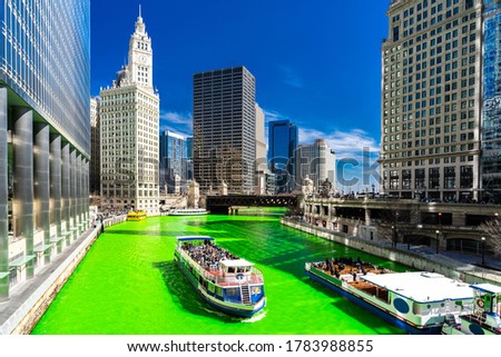 Chicago Skylines building along green dyeing river of Chicago River on St. Patrick's day festival in Chicago Downtown IL USA Royalty-Free Stock Photo #1783988855